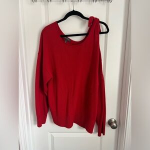 Open shoulder sweater with bow